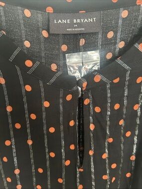 Lane Bryant Black Top with rust orange red Polka Dot and silver thread accent